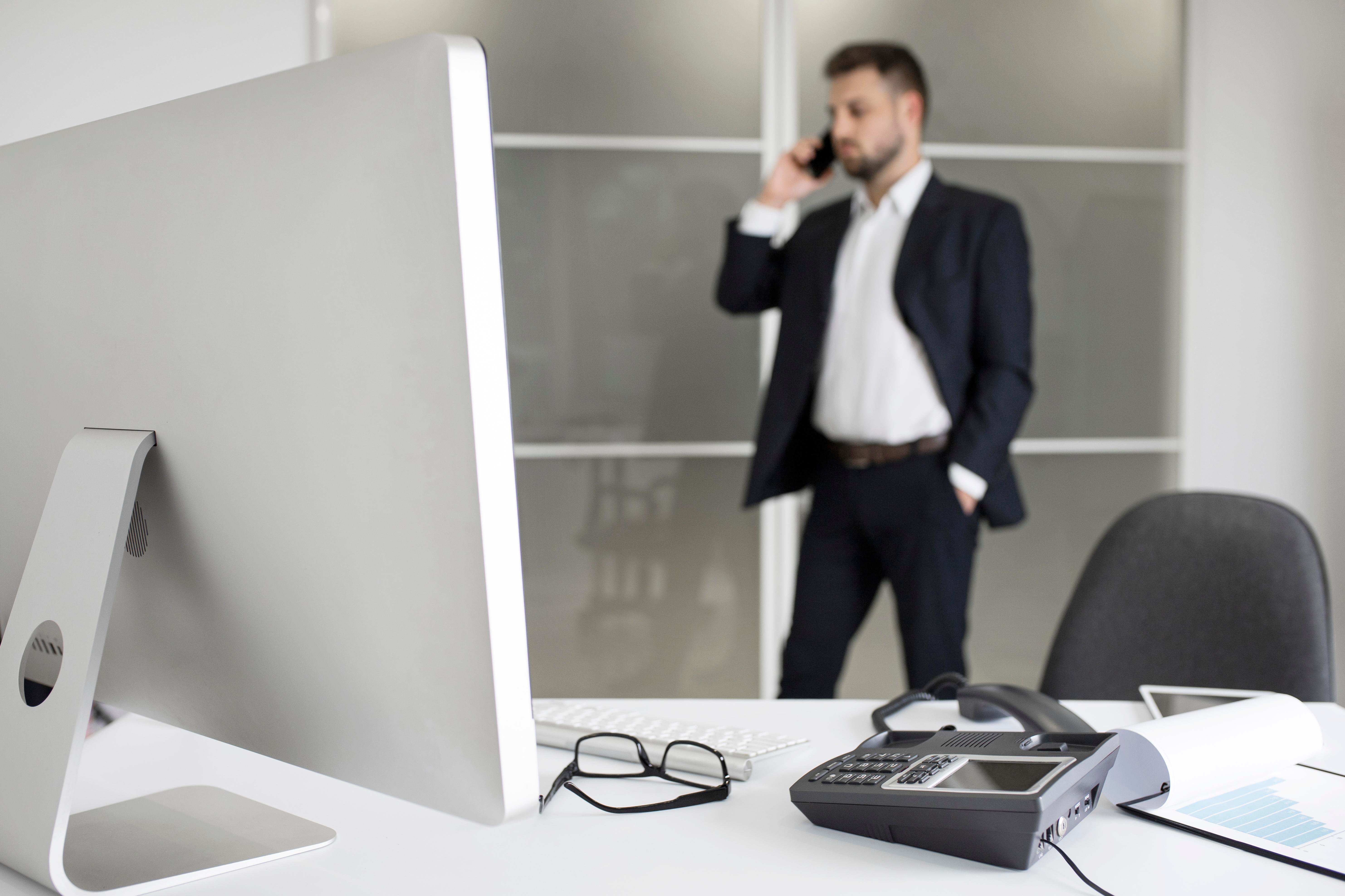 Albuquerque business professional evaluating RingCentral alternatives, considering Proclaim VoIP for better communication solutions