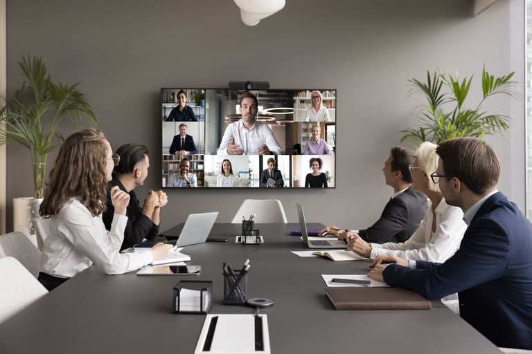 Conference room setup for business with large screen and commercial AV install for clear communication
